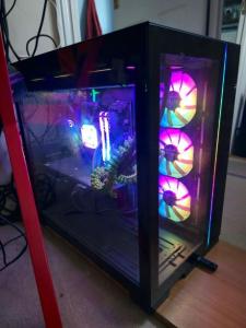 Custom Gaming PC with keyboard, mouse and monitor.